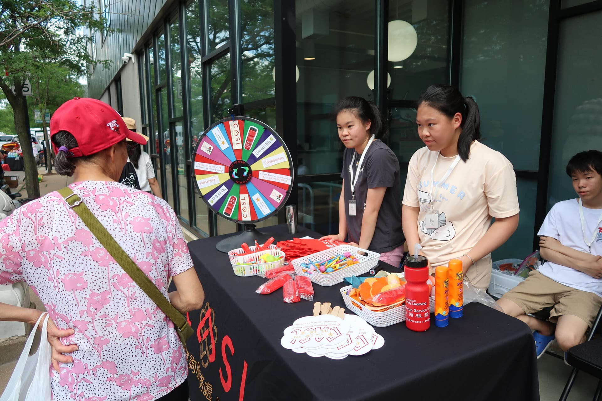 Community members learn about resources at CASL Block Party